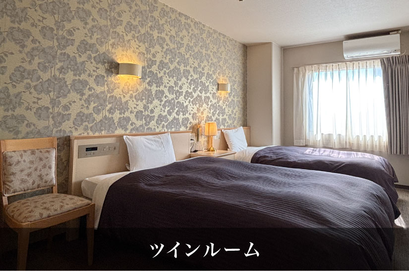 アビスイン岡山 — 岡山市北区大供 · ワイド＆ロングベッドを入れたツインルーム（公式サイトの客室写真）